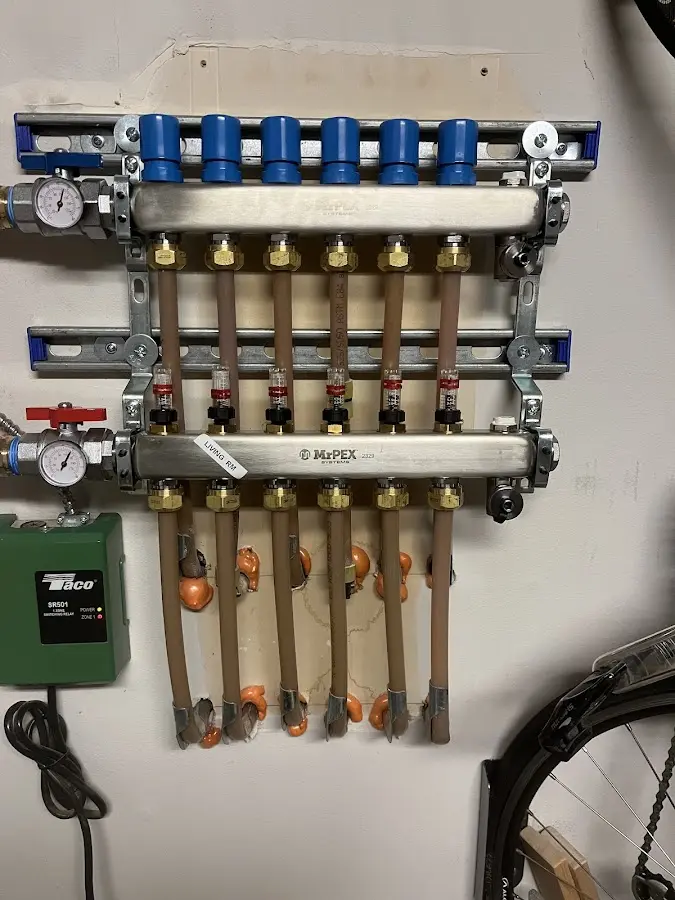 Plumber performing Water Heater Repair at a residential property in Upper Frederick